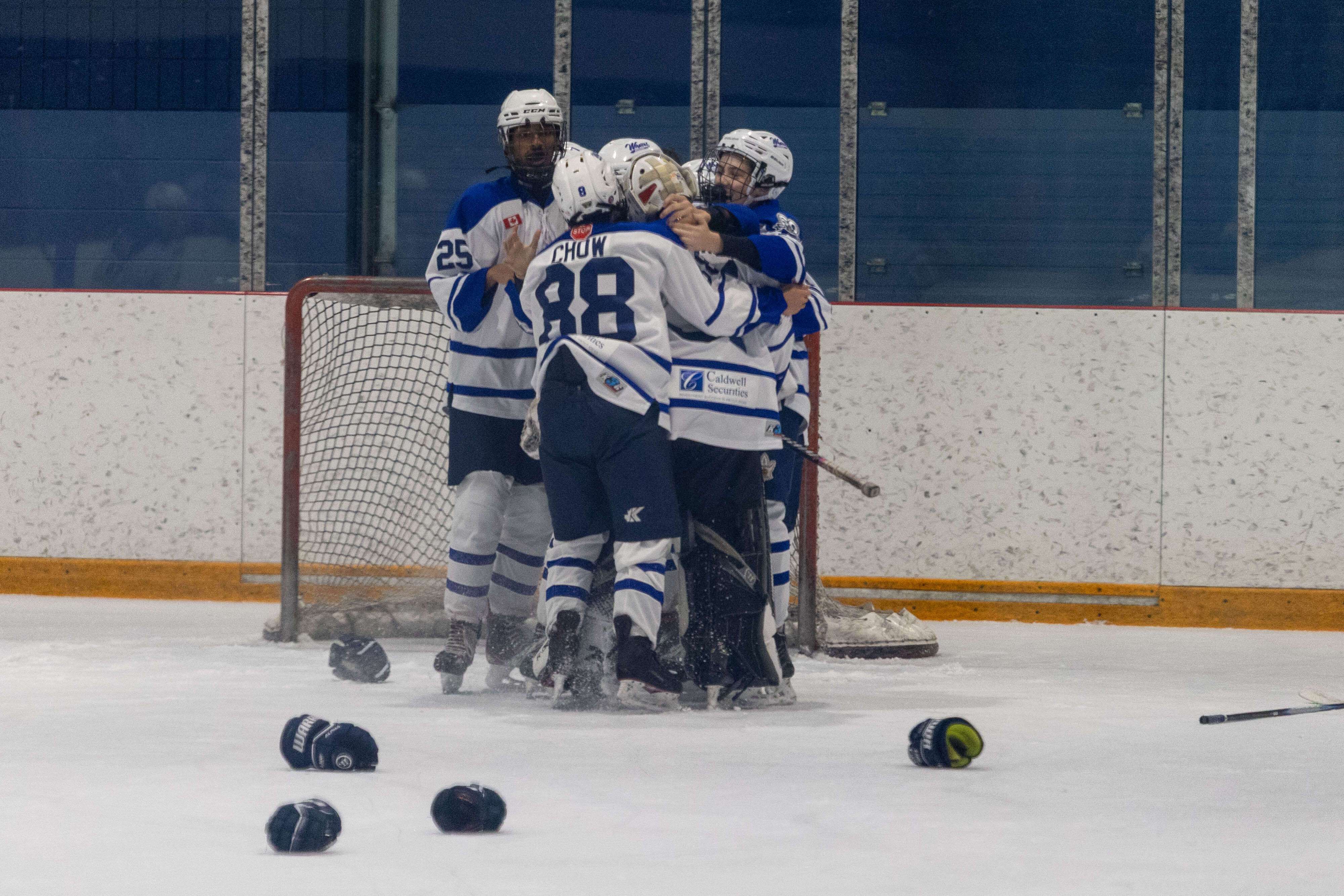U16_BB2_Dossey_Champs_team_hug.jpg